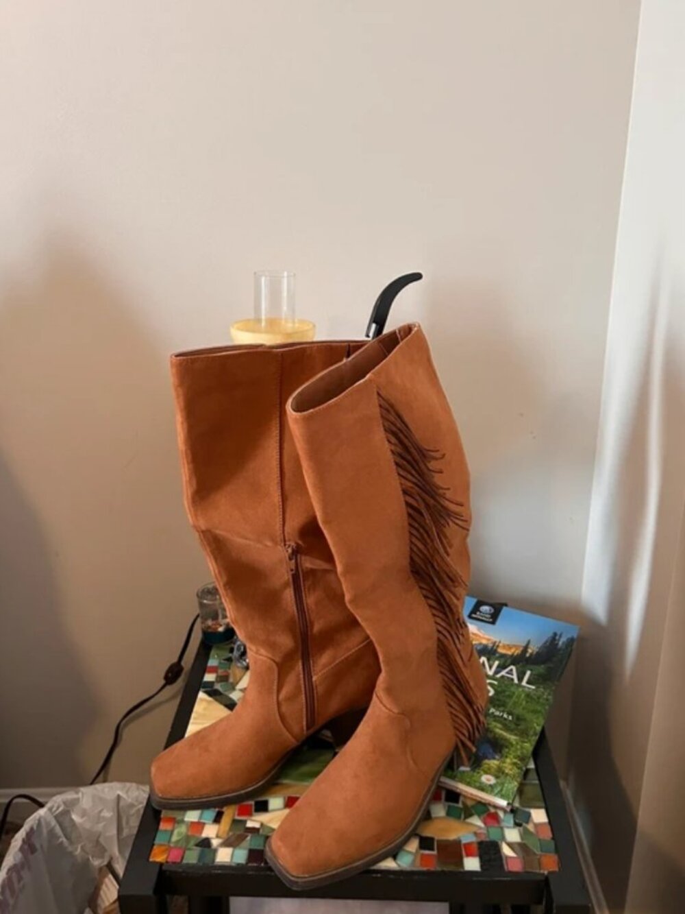 Brown fringe knee high boots